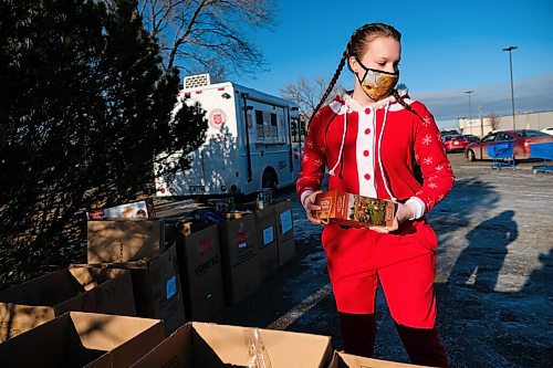 Daniel Crump / Winnipeg Free Press. Anna Cameron, a volunteer for the Salvation, sorts donated toys. The donations are part of the Salvation Armys Toy Mountain donation drive which is being done as a drive-in this year. December 5, 2020.