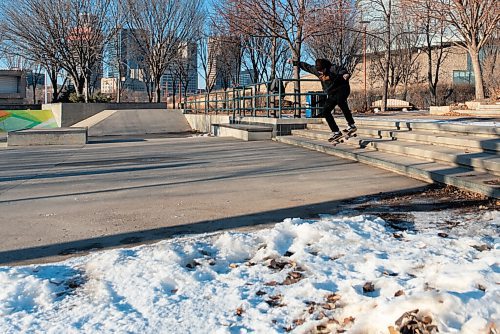 JESSE BOILY  / WINNIPEG FREE PRESS
Dylan Roy takes advantage of the warm weather by geting in some winter skate boarding at the Forks on Sunday. Roy said his friends who have been out of work due to COVID have been shovelling out the skate park to take advantage of the warm December. Sunday, Dec. 6, 2020.
Reporter: Standups