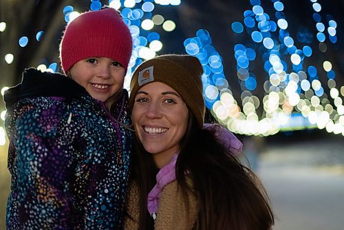 JESSE BOILY  / WINNIPEG FREE PRESS
Marie-France Desrochers and her daughter Cattleya wanted to check out the lights on the warm evening at the Forks on Sunday. Sunday, Dec. 6, 2020.
Reporter: Standup