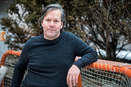 MIKAELA MACKENZIE / WINNIPEG FREE PRESS

Paul Buchanan poses for a portrait with his childhood backyard hockey net in Winnipeg on Friday, Dec. 4, 2020. For Jeff Hamilton story.

Winnipeg Free Press 2020