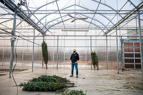 MIKAELA MACKENZIE / WINNIPEG FREE PRESS

Jordan Hiebert, co-owner of Lacoste Garden Centre, poses for a portrait in the empty tree lot area (the trees left are pre-sold) in Winnipeg on Monday, Dec. 7, 2020. For Doug Speirs story.

Winnipeg Free Press 2020