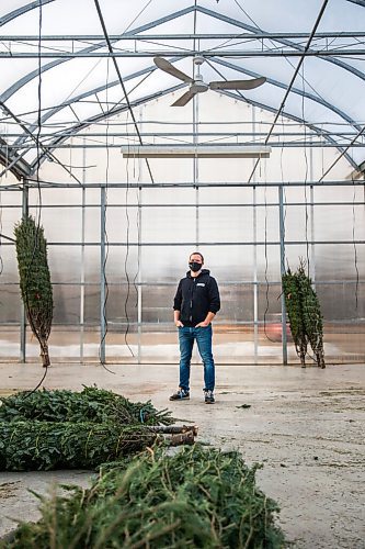 MIKAELA MACKENZIE / WINNIPEG FREE PRESS

Jordan Hiebert, co-owner of Lacoste Garden Centre, poses for a portrait in the empty tree lot area (the trees left are pre-sold) in Winnipeg on Monday, Dec. 7, 2020. For Doug Speirs story.

Winnipeg Free Press 2020