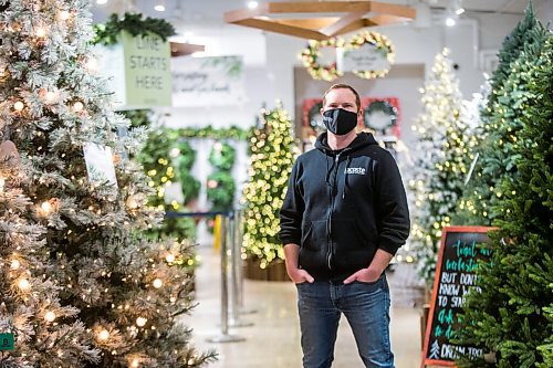 MIKAELA MACKENZIE / WINNIPEG FREE PRESS

Jordan Hiebert, co-owner of Lacoste Garden Centre, poses for a portrait with their artificial trees in Winnipeg on Monday, Dec. 7, 2020. For Doug Speirs story.

Winnipeg Free Press 2020