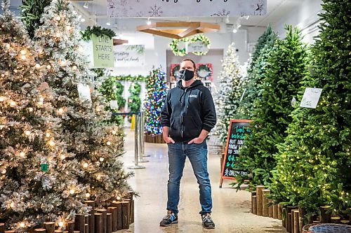 MIKAELA MACKENZIE / WINNIPEG FREE PRESS

Jordan Hiebert, co-owner of Lacoste Garden Centre, poses for a portrait with their artificial trees in Winnipeg on Monday, Dec. 7, 2020. For Doug Speirs story.

Winnipeg Free Press 2020