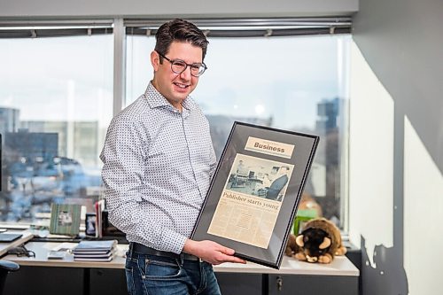 MIKAELA MACKENZIE / WINNIPEG FREE PRESS

Jonathan Strauss, owner of Strauss Event & Association Management, poses for a portrait in his office with an old Free Press article in Winnipeg on Monday, Dec. 7, 2020. For Martin Cash story.

Winnipeg Free Press 2020