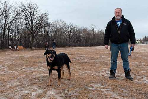 JESSE BOILY  / WINNIPEG FREE PRESS
Dan Irwin with his dog Jake take in the warmer weather at the Charleswood Off Leash Dog Park on Tuesday. Tuesday, Dec. 8, 2020.
Reporter: Cody Sellar