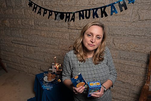 JESSE BOILY  / WINNIPEG FREE PRESS
Rena Secter Elbaze shows candles for the menorah, which many people have been unable to purchase due to current COVID restrictions,  outside her home on Tuesday. Tuesday, Dec. 8, 2020.
Reporter: Brenda Suderman