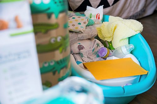 MIKAELA MACKENZIE / WINNIPEG FREE PRESS

A gift of of baby clothes and items at Desirée Leibl's home in Winnipeg on Wednesday, Dec. 9, 2020. For Aaron Epp story.

Winnipeg Free Press 2020