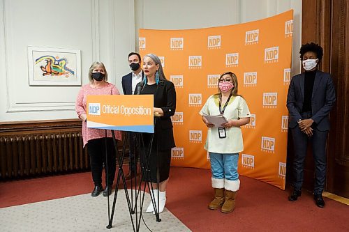 MIKE DEAL / WINNIPEG FREE PRESS
Nahanni Fontaine (speaking), NDP MLA for St Johns, and Debbie Boissonneault (left), President of CUPE Local 204 along with other members of the opposition NDP caucus Uzoma Asagwara (right), NDP Health Critic, and Adrien Sala, NDP MLA for St James (second from left) as well as a local health care worker, Emma (second from right), call for support for health care workers in the NDP Caucus Office Wednesday morning.
201209 - Wednesday, December 09, 2020.