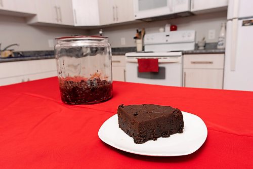 JESSE BOILY  / WINNIPEG FREE PRESS
Ave Dinzey of Purple Hibiscus, shows her Trini Black Cake, a traditional Rum Cake in Trinidad on Wednesday. Wednesday, Dec. 9, 2020.
Reporter: