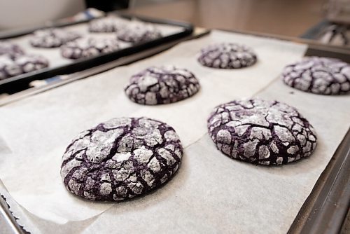 JESSE BOILY  / WINNIPEG FREE PRESS
Eejay Chua, a chef at Baon Bistro, shows some of his ube crinkle, a popular Filipino cookie for the holidays at his home on Wednesday. Wednesday, Dec. 9, 2020.
Reporter: