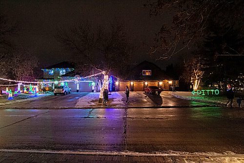 Mike Sudoma / Winnipeg Free Press
Living in the shadow of the Jasper familys Christmas light display (left), the Paterson family have finally taken over the limelight with their comical DITTO light display in their front yard on Shorecrest Dr, a popular neighbourhood for Christmas decorating.
December 3, 2020