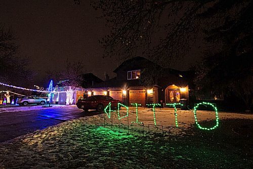 Mike Sudoma / Winnipeg Free Press
Living in the shadow of the Jasper familys Christmas light display, the Paterson family have finally taken over the limelight with their comical DITTO light display in their front yard on Shorecrest Dr, a popular neighbourhood for Christmas decorating.
December 3, 2020