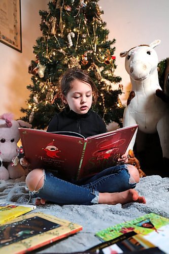 RUTH BONNEVILLE / WINNIPEG FREE PRESS

Christmas Children's BOOKS FRONT

Winter Wright (8yrs) reads Santa Baby Christmas book under her families Christmas tree Thursday.  


Dec 10h,. 2020