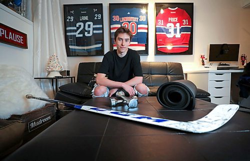 RUTH BONNEVILLE / WINNIPEG FREE PRESS

SPORTS - covid hockey

Portrait of Winnipeg Freeze goaltender, Presley Lester in his basement bad complete with home gym, lounge with hockey memorabilia for feature story on pandemic life for hockey players.


Mike Sawatzky  | Sports Reporter

Dec 11h,. 2020