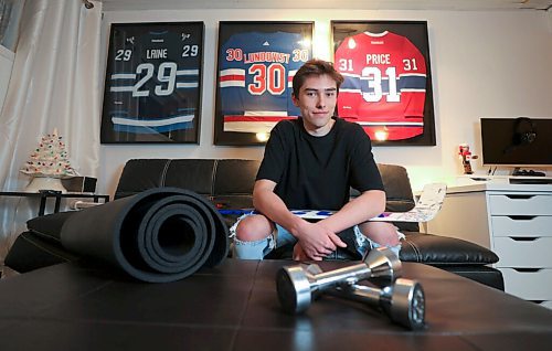 RUTH BONNEVILLE / WINNIPEG FREE PRESS

SPORTS - covid hockey

Portrait of Winnipeg Freeze goaltender, Presley Lester in his basement bad complete with home gym, lounge with hockey memorabilia for feature story on pandemic life for hockey players.


Mike Sawatzky  | Sports Reporter

Dec 11h,. 2020