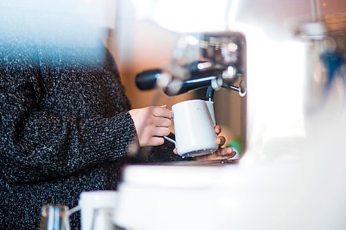 MIKAELA MACKENZIE / WINNIPEG FREE PRESS

Modern Electric Lunch coffee manager Jenny Kostuik pours a coffee at 232 Main Street in Winnipeg on Monday, Dec. 14, 2020. For Ben Waldman story.

Winnipeg Free Press 2020