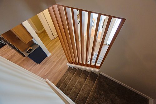 MIKE DEAL / WINNIPEG FREE PRESS
New Home
79 Crestmont Drive.
Wooden feature wall by the front door.
201214 - Monday, December 14, 2020.