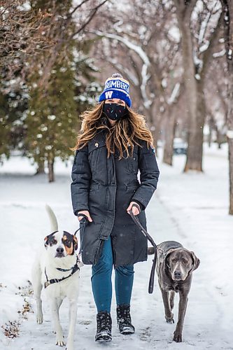 MIKAELA MACKENZIE / WINNIPEG FREE PRESS

Kim Gesell and her dogs, Petey (white) and Graycie (grey), pose for a portrait in Winnipeg on Tuesday, Dec. 15, 2020. Kim is usually excited and happy about the holidays, but not really feeling it this year (she will be celebrating alone with her husband and dogs this year). For Sabrina story.

Winnipeg Free Press 2020