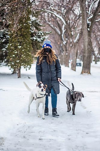 MIKAELA MACKENZIE / WINNIPEG FREE PRESS

Kim Gesell and her dogs, Petey (white) and Graycie (grey), pose for a portrait in Winnipeg on Tuesday, Dec. 15, 2020. Kim is usually excited and happy about the holidays, but not really feeling it this year (she will be celebrating alone with her husband and dogs this year). For Sabrina story.

Winnipeg Free Press 2020