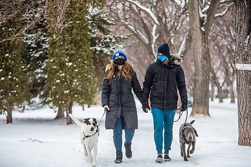 MIKAELA MACKENZIE / WINNIPEG FREE PRESS

Kim Gesell, Taren Gesell, and their dogs, Petey (white) and Graycie (grey) in Winnipeg on Tuesday, Dec. 15, 2020. Kim is usually excited and happy about the holidays, but not really feeling it this year (she will be celebrating alone with her husband and dogs this year). For Sabrina story.

Winnipeg Free Press 2020