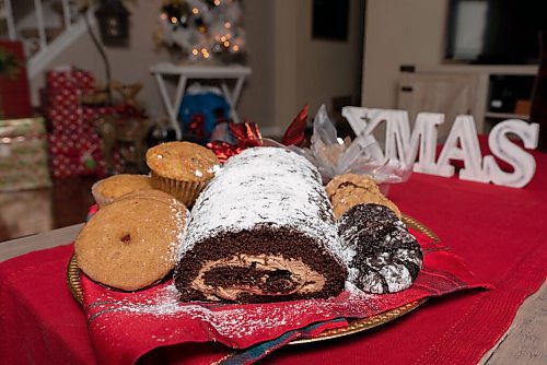 JESSE BOILY  / WINNIPEG FREE PRESS
Denise Comeault shows her Yule log along with some of her other holiday baking treats at her home on Tuesday. Tuesday, Dec. 15, 2020.
Reporter: Alan Small