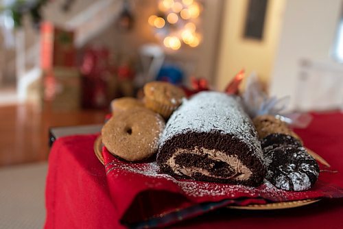 JESSE BOILY  / WINNIPEG FREE PRESS
Denise Comeault shows her Yule log along with some of her other holiday baking treats at her home on Tuesday. Tuesday, Dec. 15, 2020.
Reporter: Alan Small