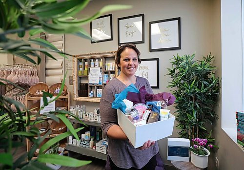RUTH BONNEVILLE / WINNIPEG FREE PRESS

BIZ - gift box

Tara Torchia, owner of The Unexpected Gift with a sample gift box opened with lots of beautiful, locally sourced, products inside.  

Small business profile about the Unexpected Gift Box. A breast cancer survivor has teamed up with another survivor to create a subscription gift box that allows customers to send curated gift boxes to people going through the disease. Without any contact necessary, the gift arrives right at peoples doors and is made specifically for a persons needs instead of being filled with things they cant use.  

Dec 15h,. 2020