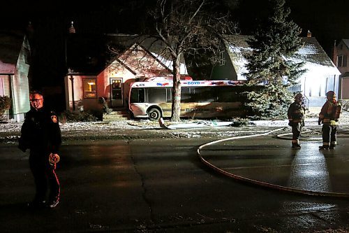 JOHN WOODS / WINNIPEG FREE PRESS
A city bus hit a house at 728 Henderson after it hit a traffic light at the intersection of Henderson and Kimberley in Winnipeg Thursday, December 17, 2020. Several people were taken with stable injuries.

Reporter: ?