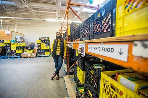 MIKAELA MACKENZIE / WINNIPEG FREE PRESS

Meaghan Erbus, advocacy and impact manager at Harvest Manitoba, poses for a portrait at the food bank in Winnipeg on Friday, Dec. 18, 2020.  For Temur Durrani story.

Winnipeg Free Press 2020