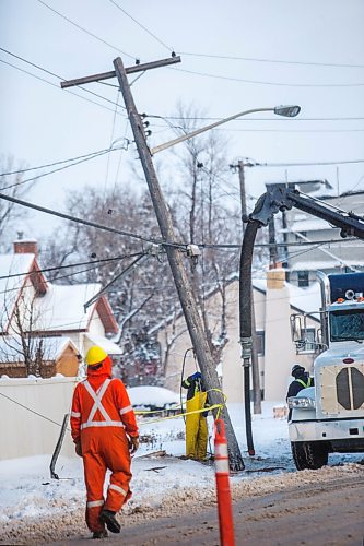 MIKAELA MACKENZIE / WINNIPEG FREE PRESS

Crews work on a toppled hydro pole, which was knocked over in a road rage incident at about four this morning, near Henderson Highway and Roosevelt Place in Winnipeg on Monday, Dec. 21, 2020. 

Winnipeg Free Press 2020