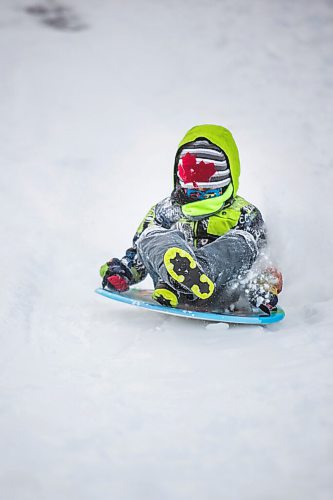 MIKAELA MACKENZIE / WINNIPEG FREE PRESS

River Wesley, six, gets some speed going down the toboggan hill at Assiniboine Park in Winnipeg on Monday, Dec. 21, 2020.  Standup.

Winnipeg Free Press 2020