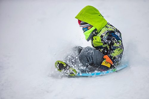 MIKAELA MACKENZIE / WINNIPEG FREE PRESS

River Wesley, six, gets some speed going down the toboggan hill at Assiniboine Park in Winnipeg on Monday, Dec. 21, 2020.  Standup.

Winnipeg Free Press 2020