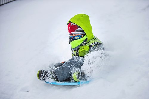 MIKAELA MACKENZIE / WINNIPEG FREE PRESS

River Wesley, six, gets some speed going down the toboggan hill at Assiniboine Park in Winnipeg on Monday, Dec. 21, 2020.  Standup.

Winnipeg Free Press 2020