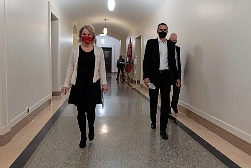 JESSE BOILY  / WINNIPEG FREE PRESS
Dr. Jazz Atwal, Deputy chief provincial public health officer, right,  and Lanette Siragusa, provincial chief nursing officer, walk down the hallway to the provincial COVID-19 update at the Legislative building on Monday. Monday, Dec. 21, 2020.
Reporter: