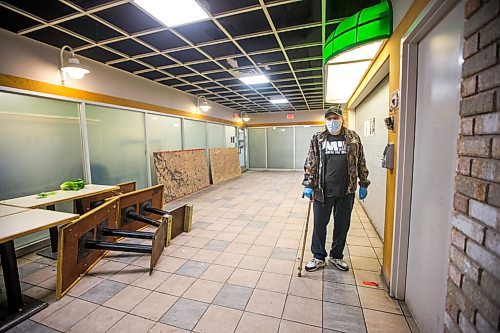 MIKAELA MACKENZIE / WINNIPEG FREE PRESS

Dave Comeau, who has moved in with his mother as he fears for her safety, shows an area where squatters frequent at St. Andrew's Place seniors (55+) residence in Winnipeg on Monday, Dec. 21, 2020. 

Winnipeg Free Press 2020