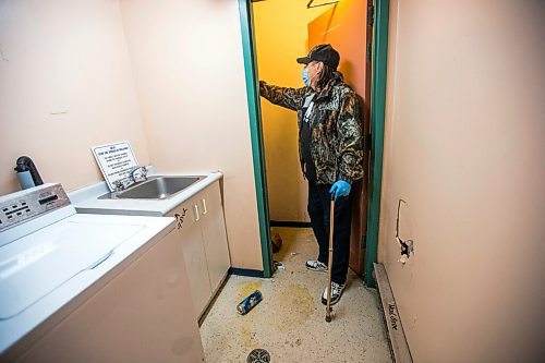 MIKAELA MACKENZIE / WINNIPEG FREE PRESS

Dave Comeau, who has moved in with his mother as he fears for her safety, shows the damage in the laundry room at St. Andrew's Place seniors (55+) residence in Winnipeg on Monday, Dec. 21, 2020. 

Winnipeg Free Press 2020