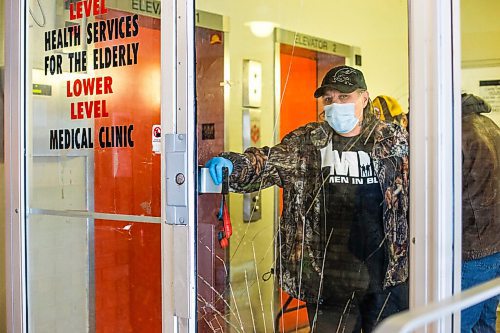 MIKAELA MACKENZIE / WINNIPEG FREE PRESS

Dave Comeau, who has moved in with his mother as he fears for her safety, shows the damage at St. Andrew's Place seniors (55+) residence in Winnipeg on Monday, Dec. 21, 2020. 

Winnipeg Free Press 2020