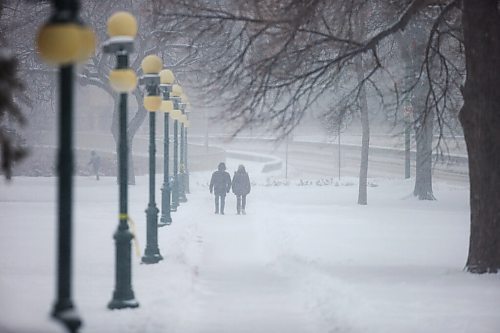 MIKAELA MACKENZIE / WINNIPEG FREE PRESS

Folks walk through the snowy Manitoba Legislative Building grounds in Winnipeg on Tuesday, Dec. 22, 2020. A winter storm is expected to dump even more snow on the city, making for a very white Christmas this year. Standup.

Winnipeg Free Press 2020