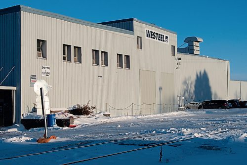 JESSE BOILY  / WINNIPEG FREE PRESS
The  AGI Westeel building, where about 90 per cent of the workers have been laid off, at 450 Rue Desautels on Wednesday. Wednesday, Dec. 23, 2020.
Reporter: