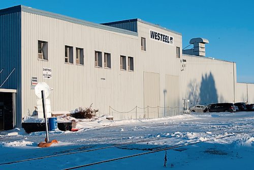 JESSE BOILY  / WINNIPEG FREE PRESS
The  AGI Westeel building, where about 90 per cent of the workers have been laid off, at 450 Rue Desautels on Wednesday. Wednesday, Dec. 23, 2020.
Reporter: