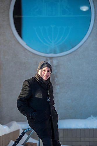 MIKAELA MACKENZIE / WINNIPEG FREE PRESS

Rabbi Allan Finkel poses for a portrait in front of Temple Shalom in Winnipeg on Wednesday, Dec. 23, 2020. He started doing shiva (the traditional Jewish mourning period) via Zoom, and found that it was a really meaningful experience for all those involved, albeit different than the in-person version. For Melissa Martin story.

Winnipeg Free Press 2020