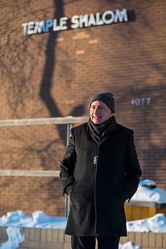 MIKAELA MACKENZIE / WINNIPEG FREE PRESS

Rabbi Allan Finkel poses for a portrait in front of Temple Shalom in Winnipeg on Wednesday, Dec. 23, 2020. He started doing shiva (the traditional Jewish mourning period) via Zoom, and found that it was a really meaningful experience for all those involved, albeit different than the in-person version. For Melissa Martin story.

Winnipeg Free Press 2020