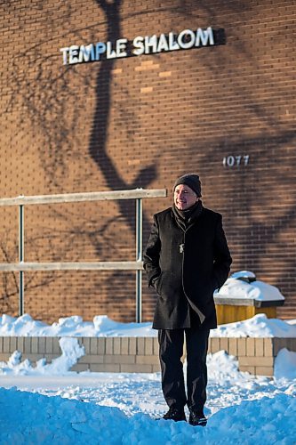 MIKAELA MACKENZIE / WINNIPEG FREE PRESS

Rabbi Allan Finkel poses for a portrait in front of Temple Shalom in Winnipeg on Wednesday, Dec. 23, 2020. He started doing shiva (the traditional Jewish mourning period) via Zoom, and found that it was a really meaningful experience for all those involved, albeit different than the in-person version. For Melissa Martin story.

Winnipeg Free Press 2020