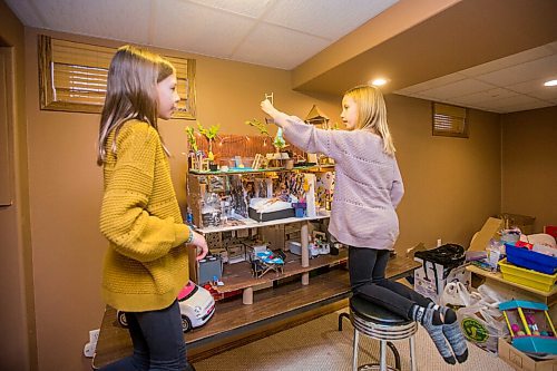 MIKAELA MACKENZIE / WINNIPEG FREE PRESS

Isla Monro, 11 (left), and Grace Rhodes, 10, show off their Barbie house made of recycled materials in Winnipeg on Thursday, Dec. 24, 2020. For Maggie Macintosh story.

Winnipeg Free Press 2020