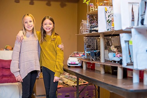 MIKAELA MACKENZIE / WINNIPEG FREE PRESS

Grace Rhodes, 10 (left), and Isla Monro, 11, pose for a portrait in front of their Barbie house made of recycled materials in Winnipeg on Thursday, Dec. 24, 2020. For Maggie Macintosh story.

Winnipeg Free Press 2020