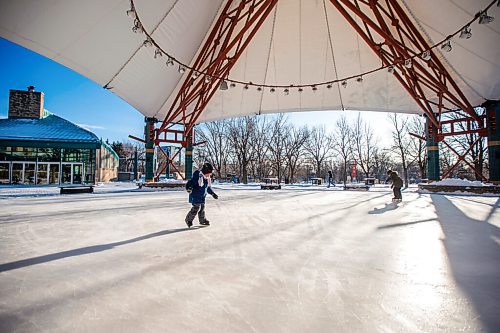 MIKAELA MACKENZIE / WINNIPEG FREE PRESS

Felix Mahe, five (left), and his brother, Samuel Mahe, eight, brave the cold to go skating for the first time this winter at The Forks in Winnipeg on Thursday, Dec. 24, 2020. The canopy rink and some of the trails at The Forks opened yesterday. Standup.

Winnipeg Free Press 2020