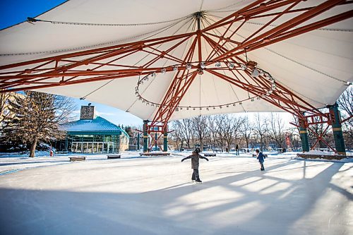 MIKAELA MACKENZIE / WINNIPEG FREE PRESS

Samuel Mahe, eight (left), and his brother, Felix Mahe, five, brave the cold to go skating for the first time this winter at The Forks in Winnipeg on Thursday, Dec. 24, 2020. The canopy rink and some of the trails at The Forks opened yesterday. Standup.

Winnipeg Free Press 2020