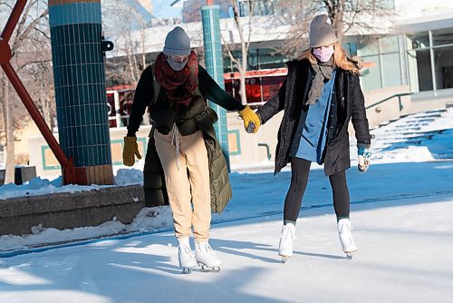 JESSE BOILY  / WINNIPEG FREE PRESS
Lauryn Leblanc, left, and Madelyn Mierau went for skate Christmas morning at The Forks on Friday. Mierau had just received her skates as a present for Christmas. Friday, Dec. 25, 2020.
Reporter: Standup