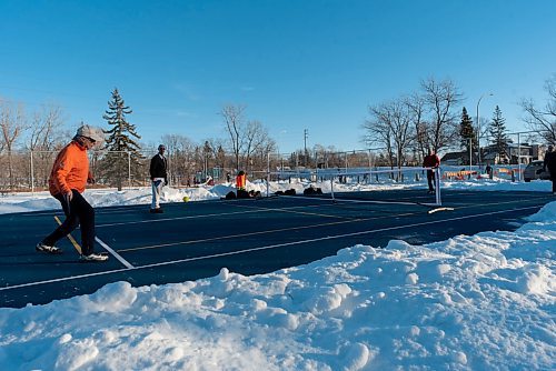 JESSE BOILY  / WINNIPEG FREE PRESS
Some men play some pickleball on the nice weather day at Wellington Park on Friday. Friday, Dec. 25, 2020.
Reporter:Standup